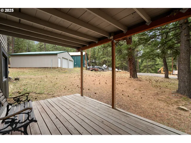 a view of a backyard of the house