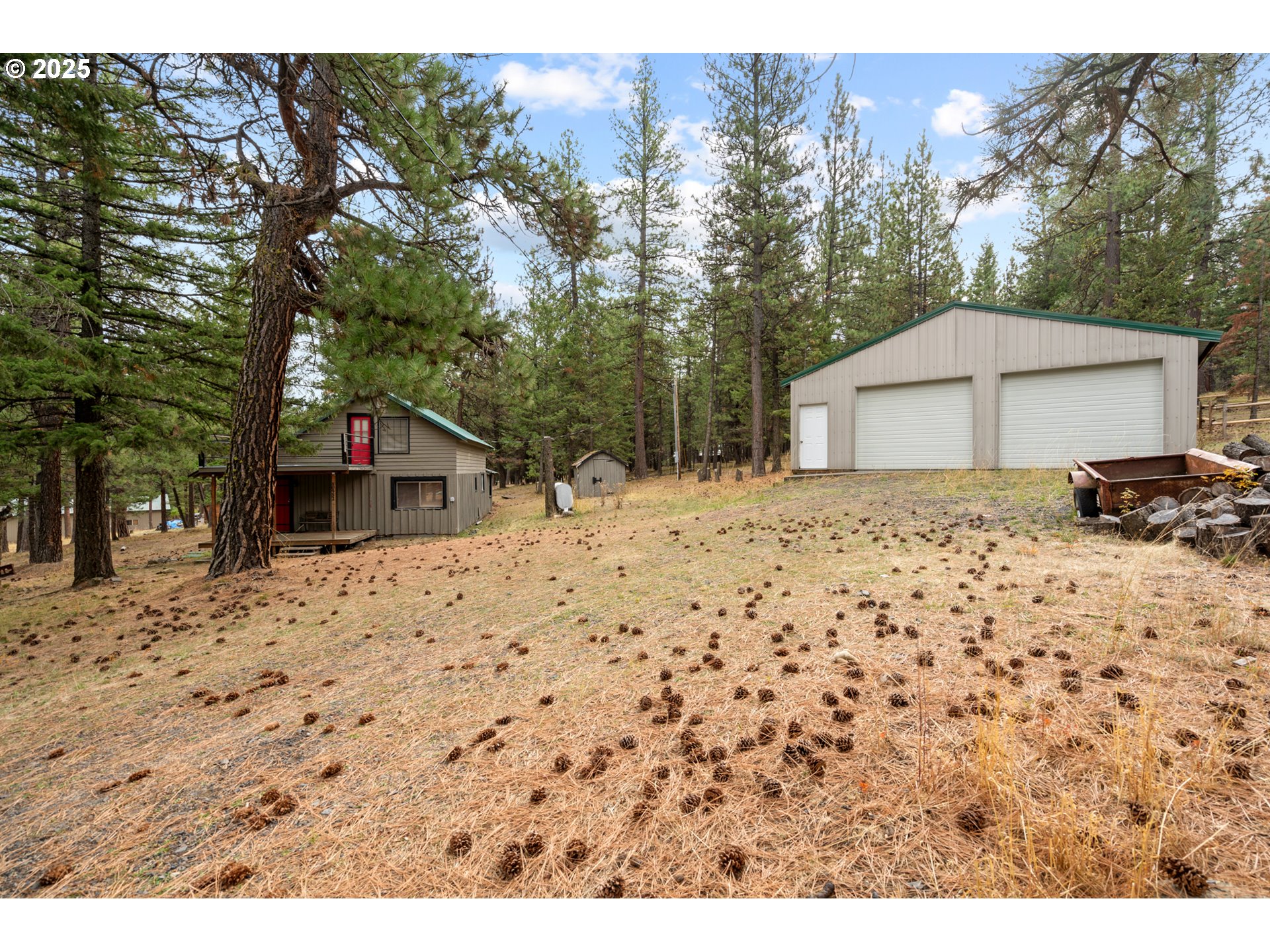 80982 Cougar Lane Heppner, OR 97836 - Photo 32 of 46 a view of wooden house with a snow and trees