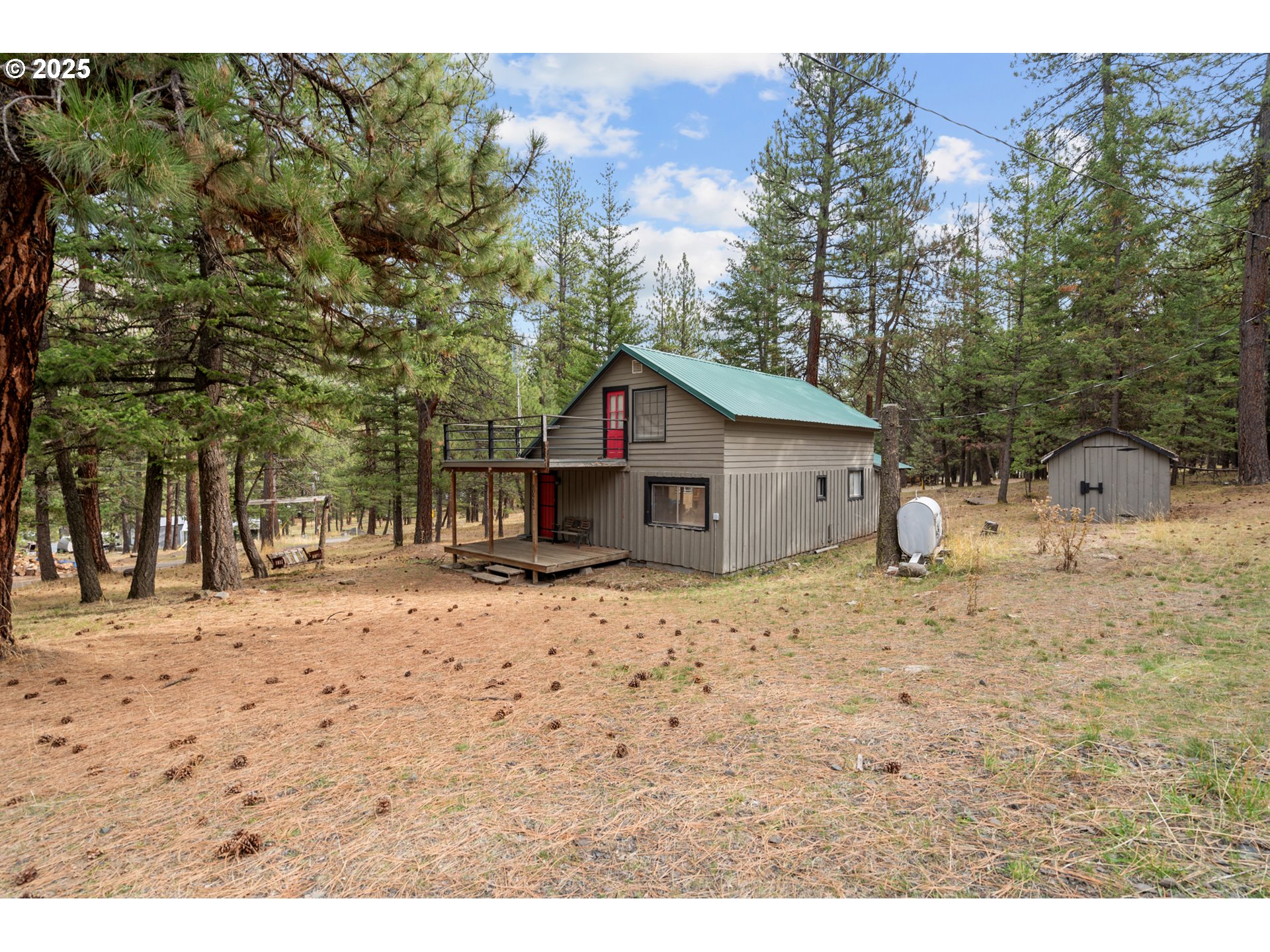 80982 Cougar Lane Heppner, OR 97836 - Photo 36 of 46 a wooden house with a outdoor space