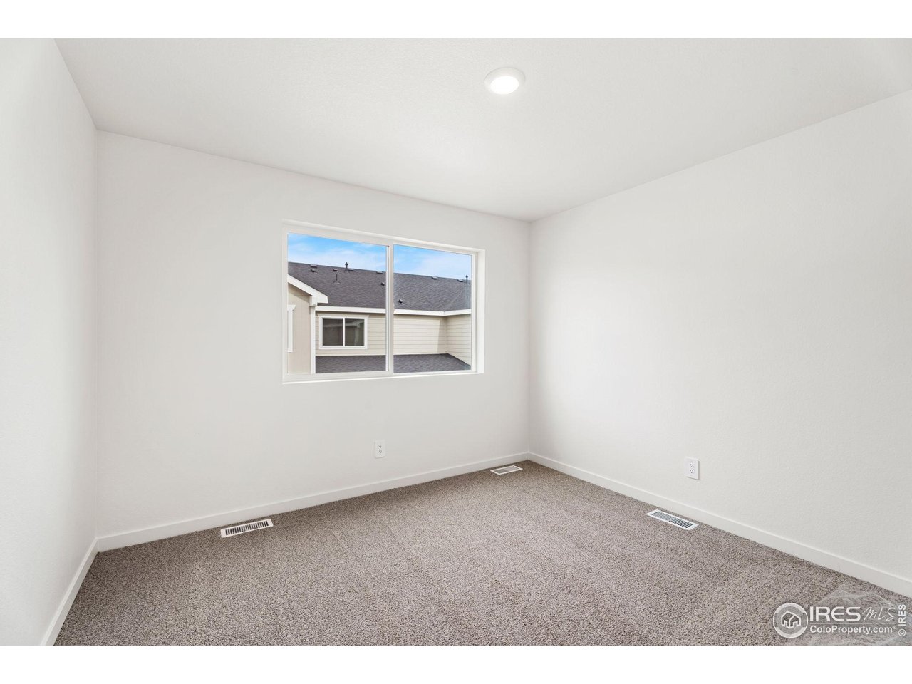 3748 Pinnacles Court Evans, CO 80620 - Photo 7 of 14 a view of an empty room