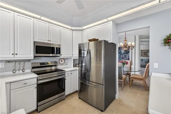 $619,000 | 24619 Ivory Cane Drive, Unit 203, Bonita Springs, FL 34134