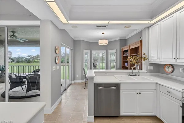 $619,000 | 24619 Ivory Cane Drive, Unit 203, Bonita Springs, FL 34134