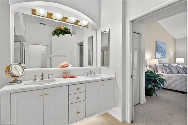 $619,000 | 24619 Ivory Cane Drive, Unit 203, Bonita Springs, FL 34134