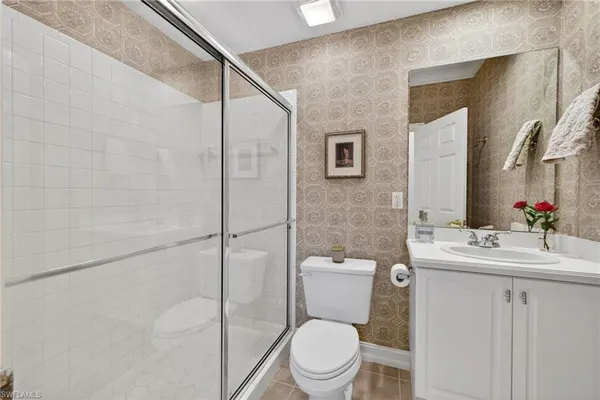$619,000 | 24619 Ivory Cane Drive, Unit 203, Bonita Springs, FL 34134