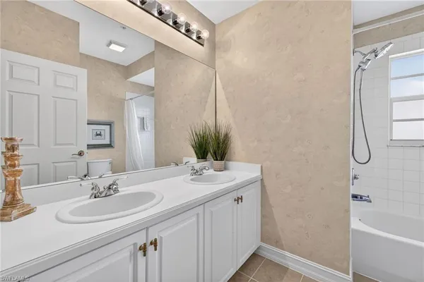 $619,000 | 24619 Ivory Cane Drive, Unit 203, Bonita Springs, FL 34134