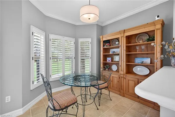 $619,000 | 24619 Ivory Cane Drive, Unit 203, Bonita Springs, FL 34134