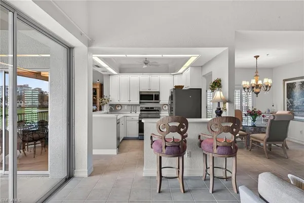 $619,000 | 24619 Ivory Cane Drive, Unit 203, Bonita Springs, FL 34134