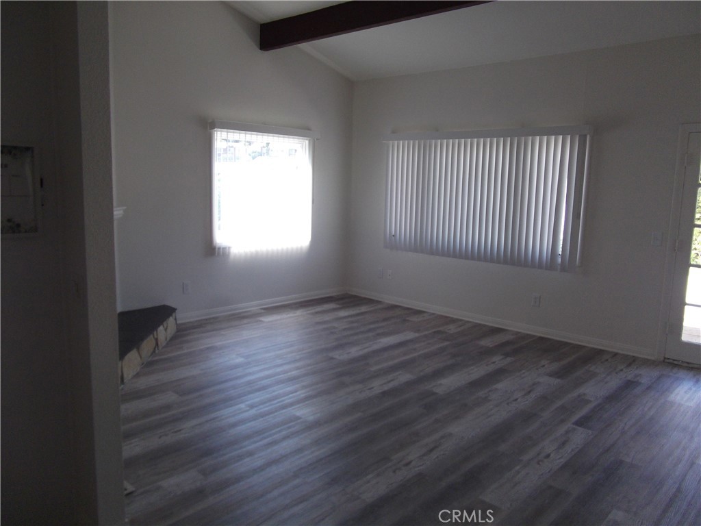 34152 Crystal Lantern Dana Point, CA 92629 - Photo 5 of 21 an empty room with wooden floor and windows