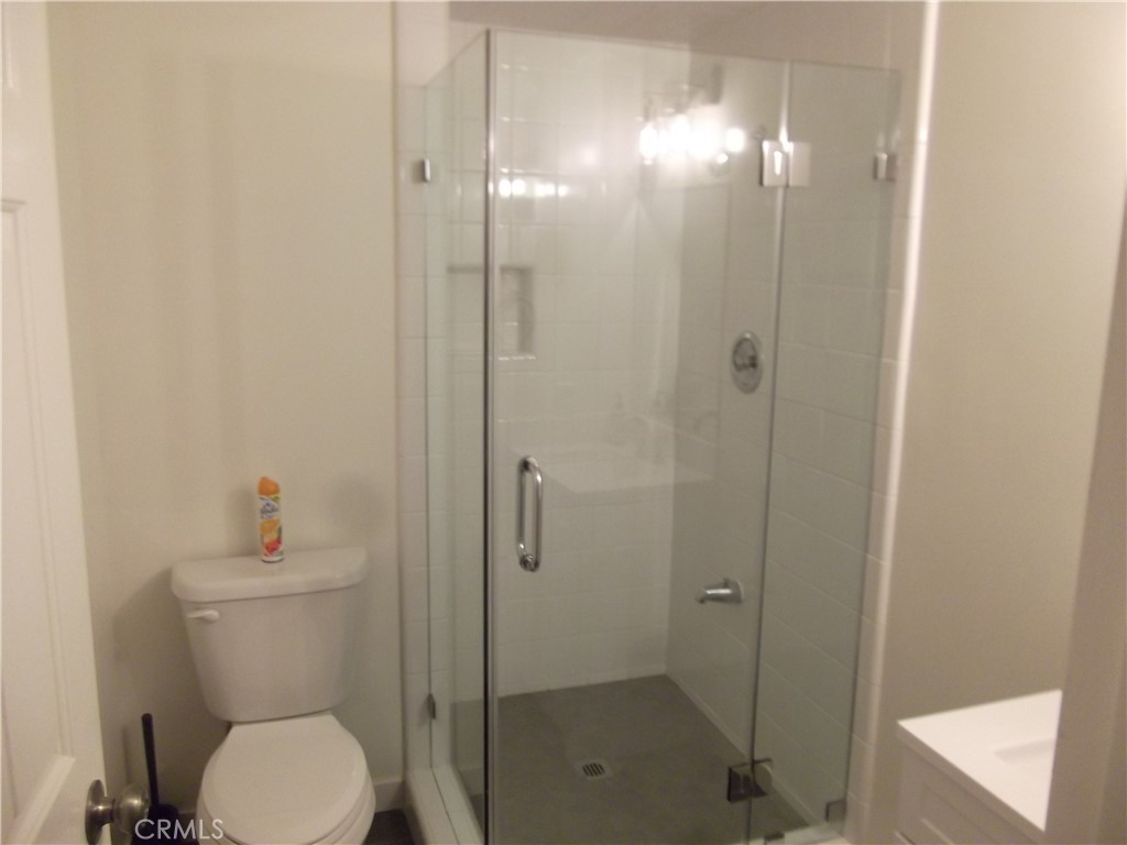 34152 Crystal Lantern Dana Point, CA 92629 - Photo 9 of 21 a bathroom with a toilet and a shower