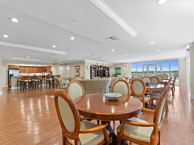 a room with a bed and a chandelier