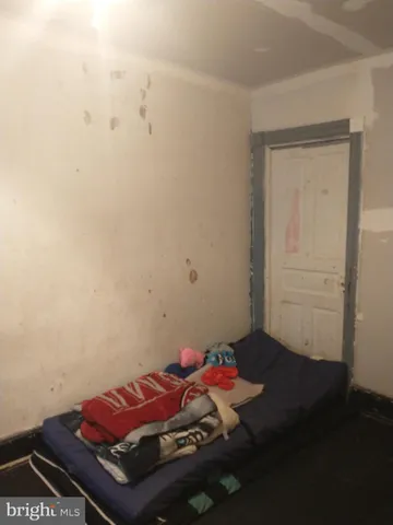 a room with furniture and wooden floor