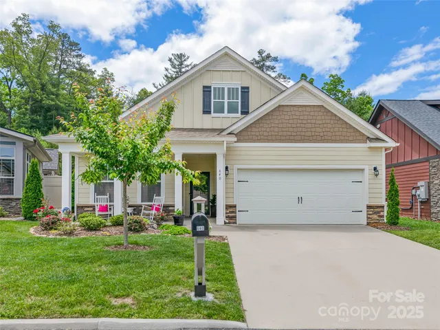 a front view of house with garden