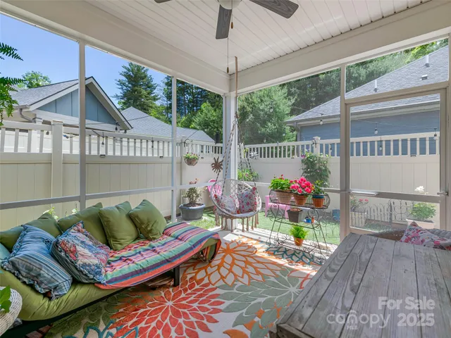 a reading room with furniture and wooden floor