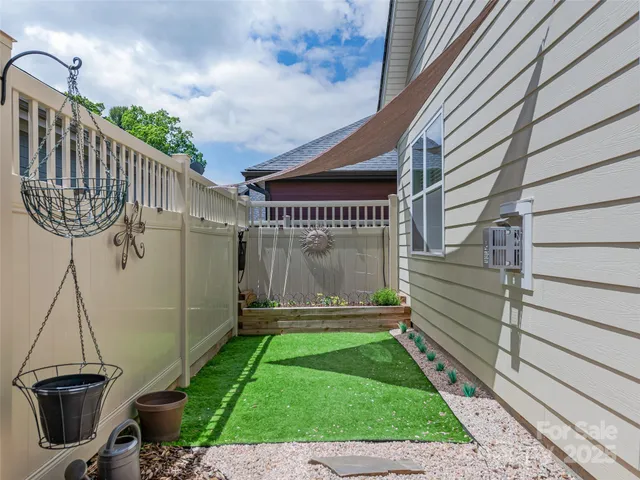 a house view with a garden space