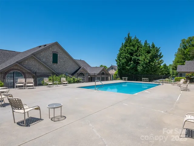 a front view of house with outdoor space and shops