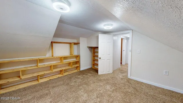 a bathroom with a sink a mirror and a bathtub