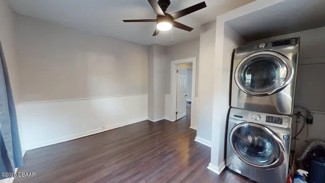 a view of a storage & utility room with wooden floor
