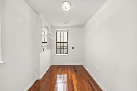 an empty room with windows