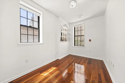 an empty room with windows
