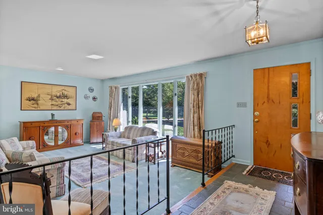 a view of a lake with a house in the background