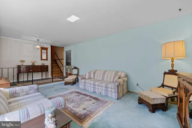 a view of a swimming pool with a patio and swimming pool