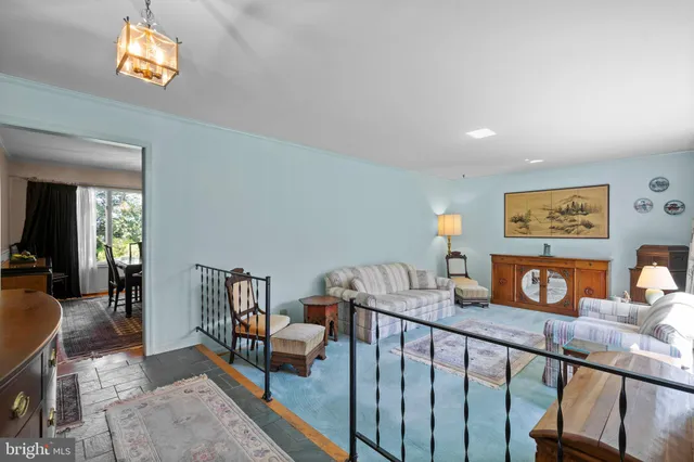 an aerial view of a house with a garden