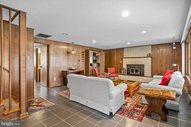 a bathroom with a sink toilet and a mirror