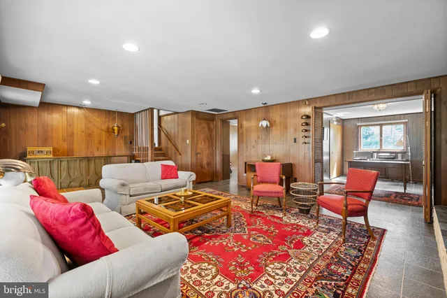 a bathroom with a sink toilet and a mirror
