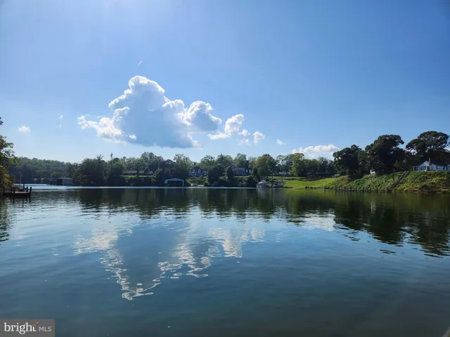 a view of a lake with a mountain in the background