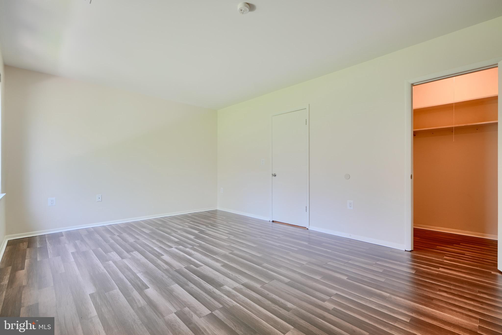 106 Cross Keys Road, Unit R106C Baltimore, MD 21210 - Photo 16 of 26 Primary Bedroom with Walk In closet