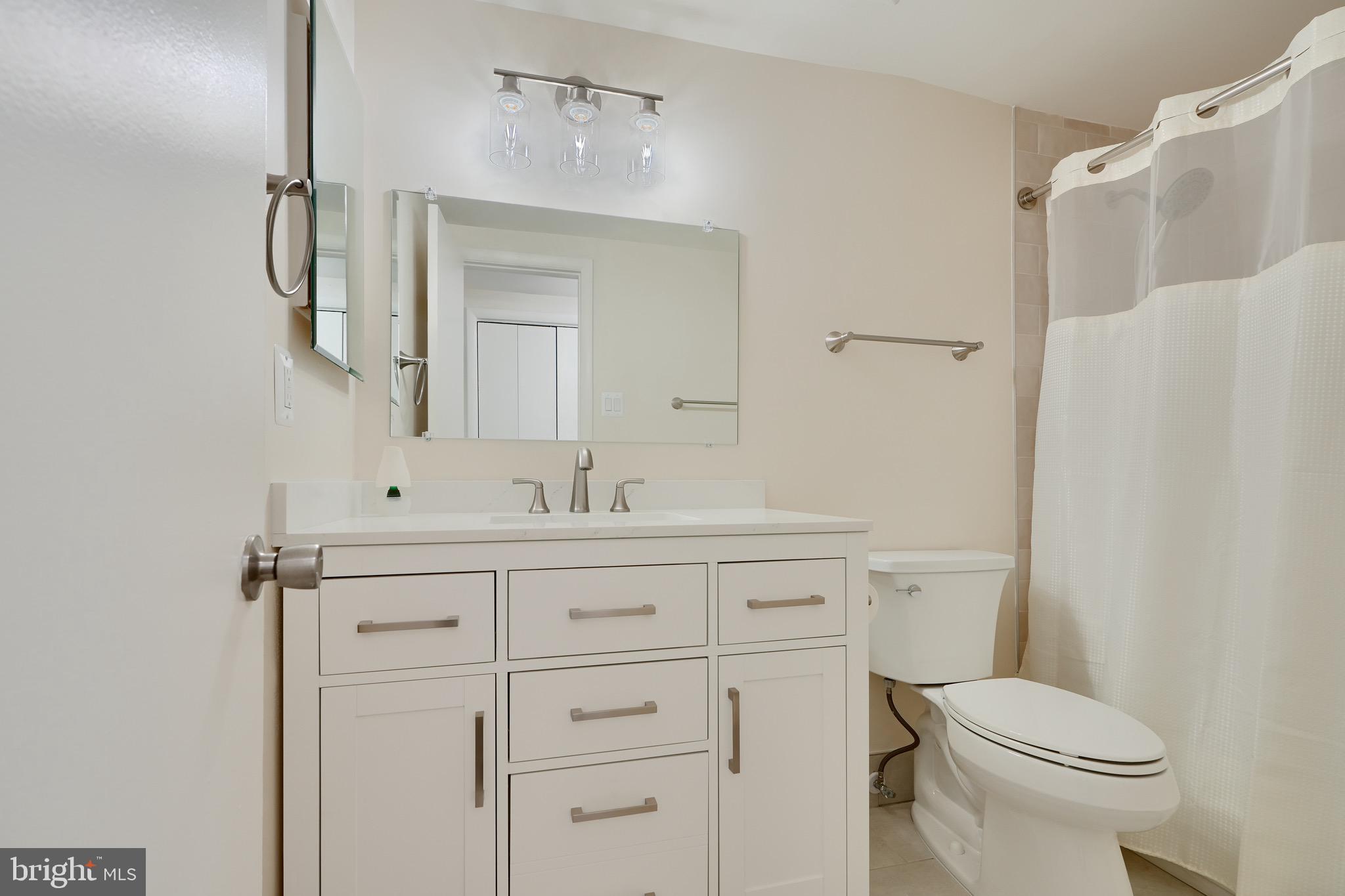 106 Cross Keys Road, Unit R106C Baltimore, MD 21210 - Photo 18 of 26 Beautiful Newly Updated Bathroom