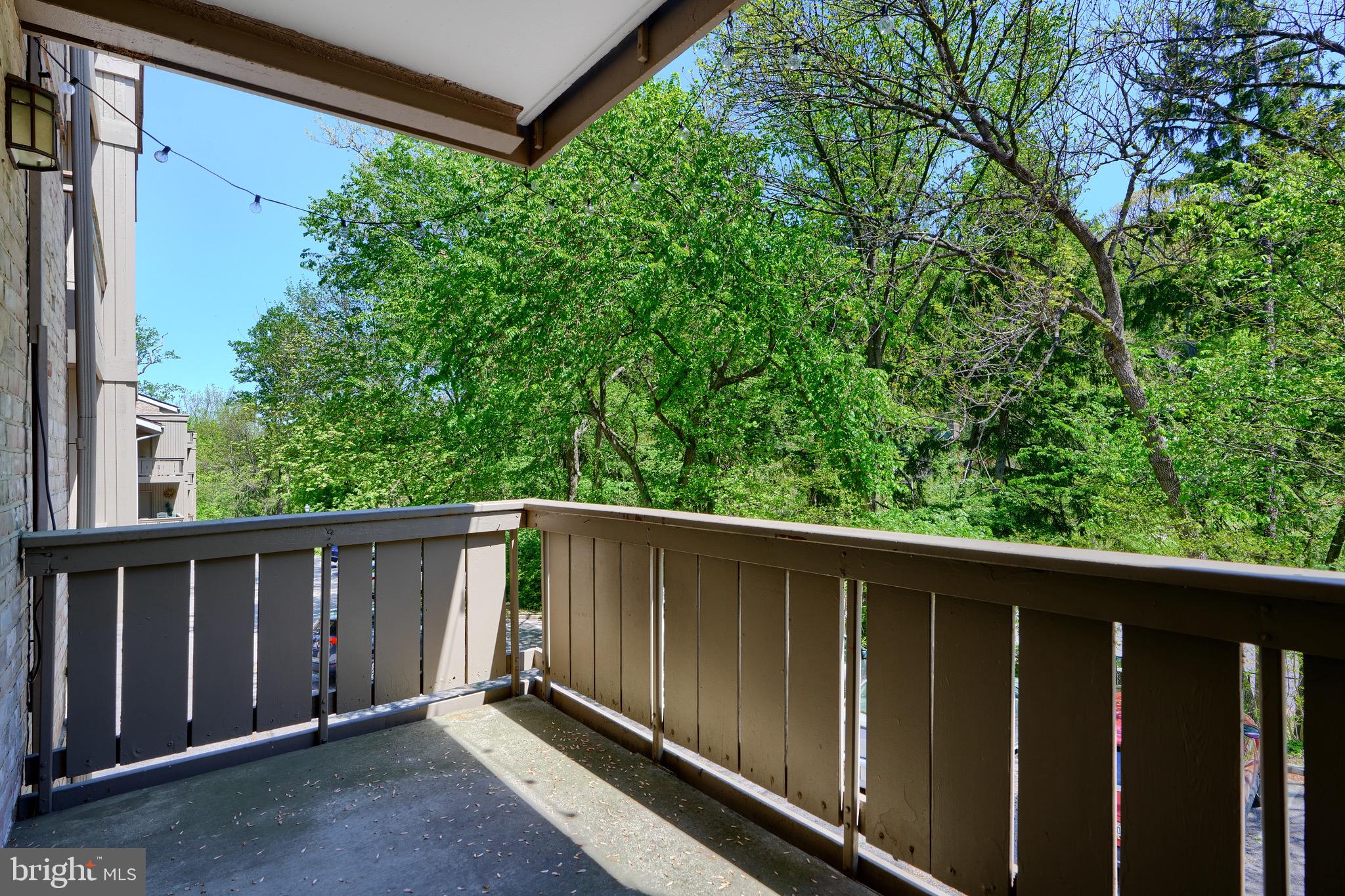 106 Cross Keys Road, Unit R106C Baltimore, MD 21210 - Photo 22 of 26 Deck/Balcony off Dining Room