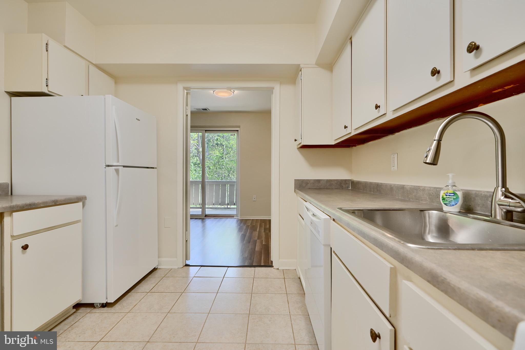 106 Cross Keys Road, Unit R106C Baltimore, MD 21210 - Photo 8 of 26 Kitchen with Newer Appliances