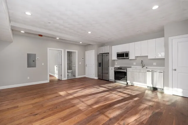 a view of a kitchen with a sink cabinets and a kitchen
