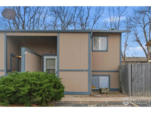 a black and white house with a outdoor space