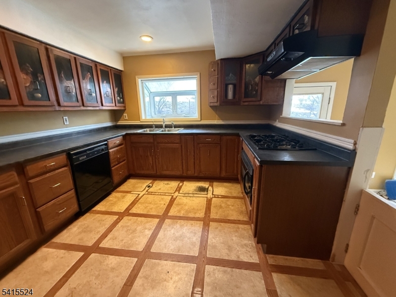 150 Karrville Road Port Murray, NJ 07865 - Photo 17 of 40 a kitchen with stainless steel appliances granite countertop a stove a sink and a microwave