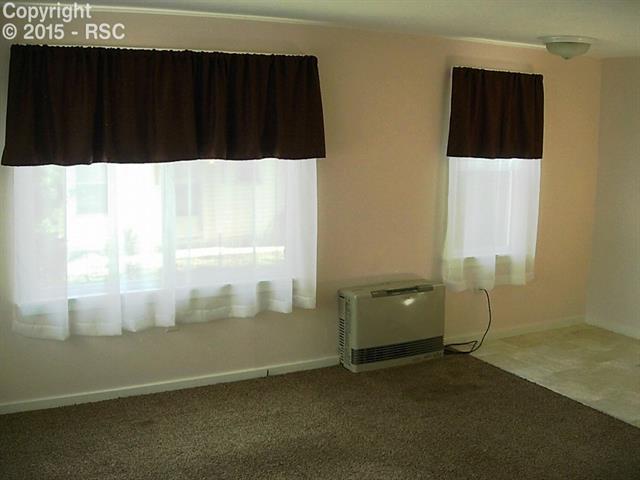 714 Prairie Road, Unit A & #B Colorado Springs, CO 80909 - Photo 8 of 22 Unit A with installed efficient gas heater.