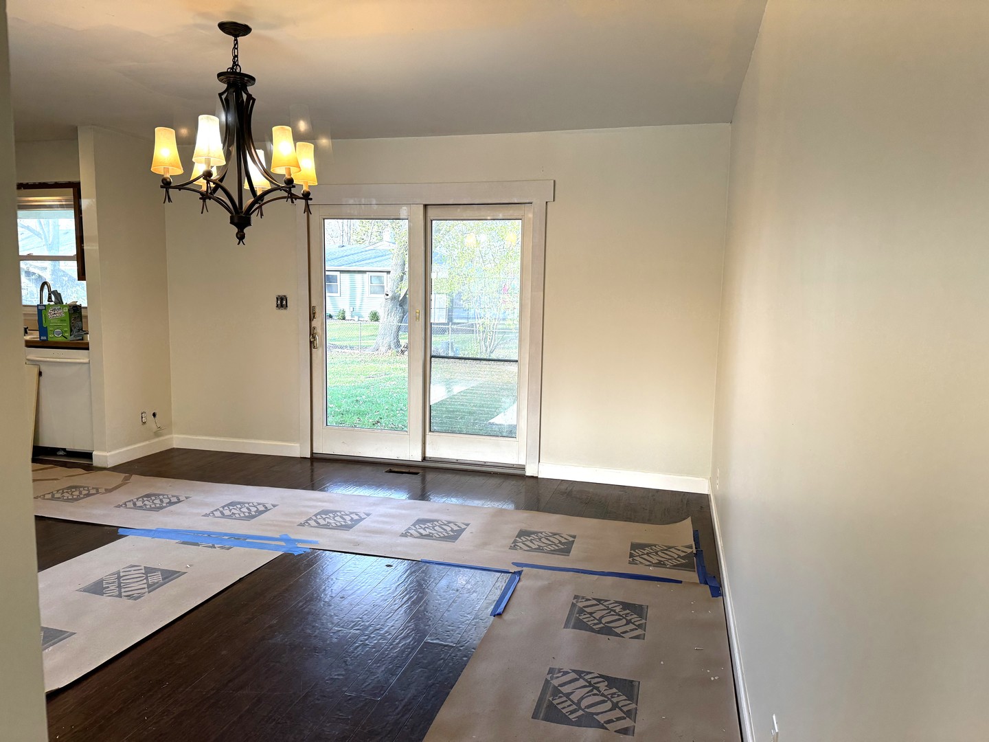 9 Pickford Road Montgomery, IL 60538 - Photo 4 of 23 a view of a livingroom with wooden floor and a ceiling fan