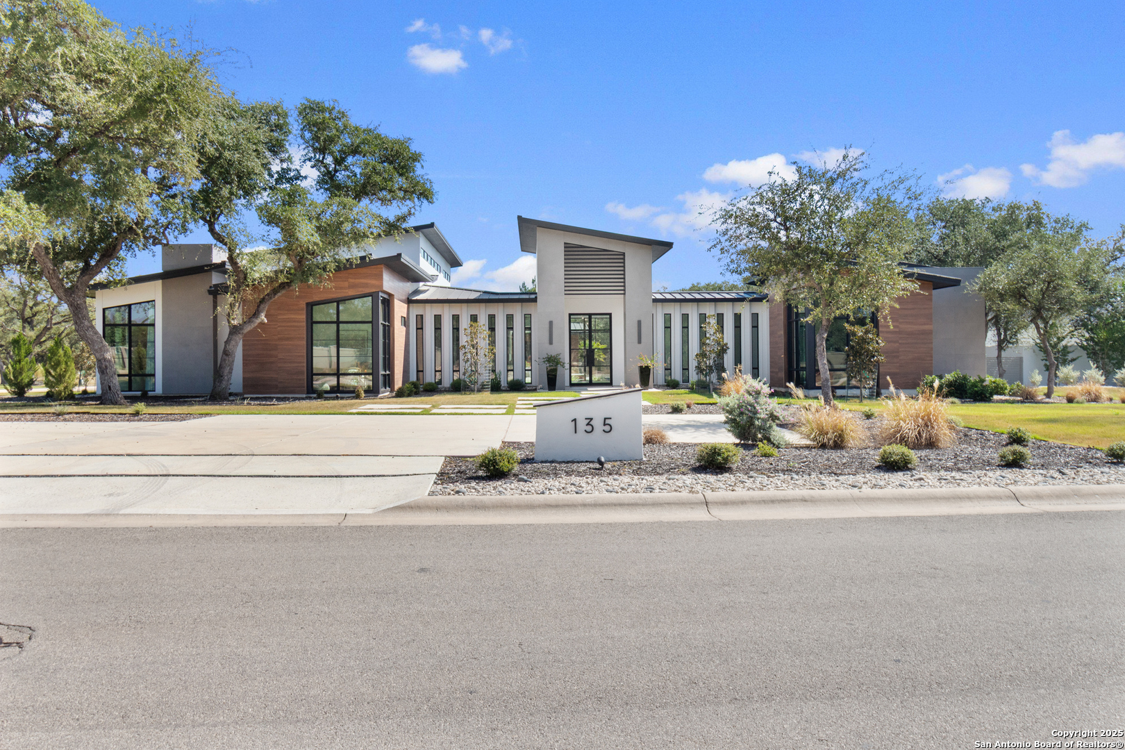 135 Whittingham Road San Antonio, TX 78231 - Photo 2 of 43 a street view along with residential houses