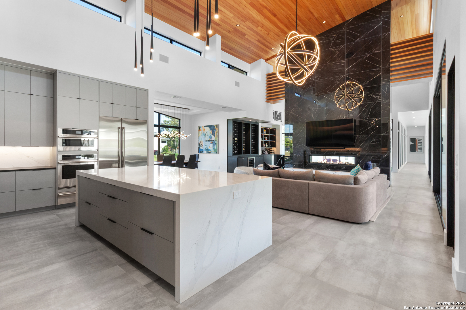 135 Whittingham Road San Antonio, TX 78231 - Photo 9 of 43 a large white kitchen with granite countertop lots of counter top space