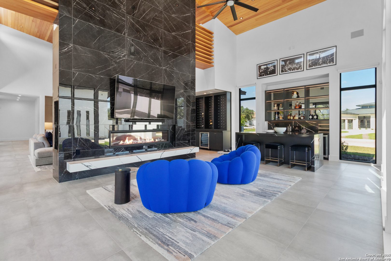 135 Whittingham Road San Antonio, TX 78231 - Photo 10 of 43 a kitchen with stainless steel appliances kitchen island granite countertop a sink and cabinets