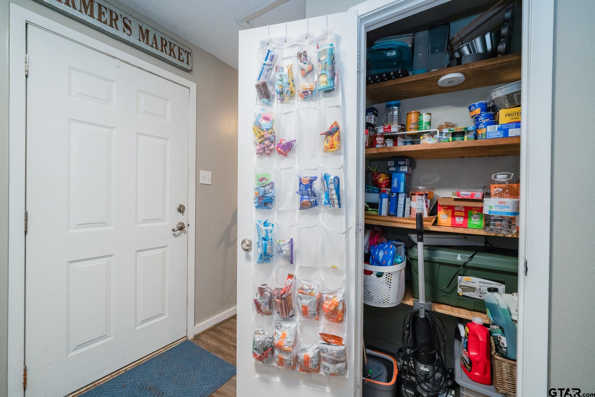 208 East Center Street White Oak, TX 75693 - Photo 18 of 31 a room with storage and utility room