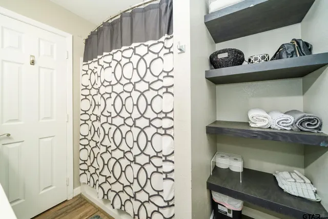 a kitchen with a stove and cabinets