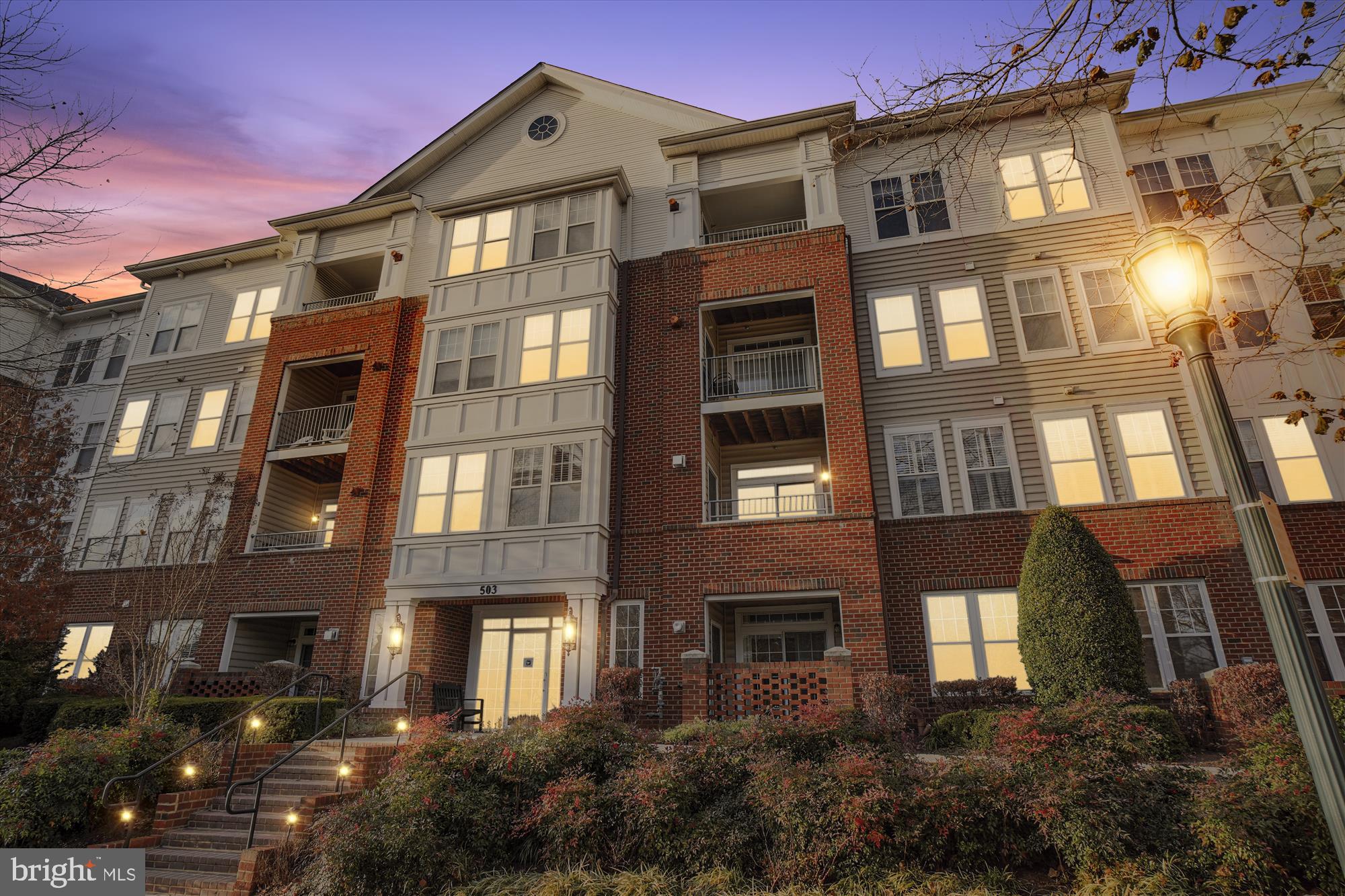 503 King Farm Boulevard, Unit 406 Rockville, MD 20850 - Photo 1 of 68 a front view of a multi story building