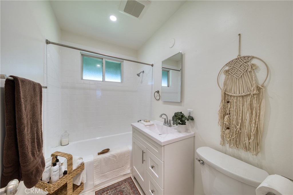 2531 Calmia Road Duarte, CA 91010 - Photo 20 of 30 a bathroom with a sink toilet and shower