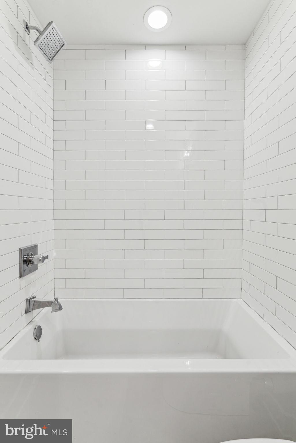 1335 North 30th Street Philadelphia, PA 19121 - Photo 26 of 58 a bathroom with a bathtub