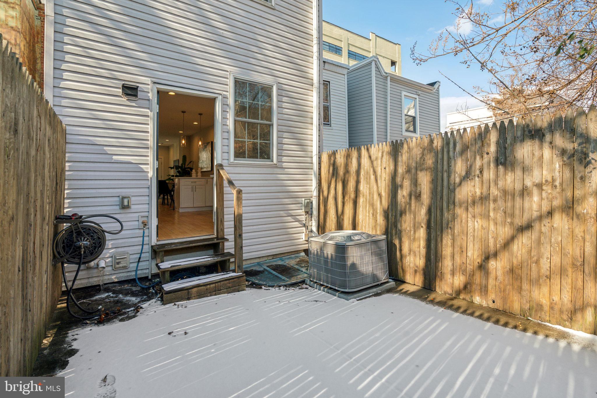 1335 North 30th Street Philadelphia, PA 19121 - Photo 55 of 58 a view of a house with a door and wooden floor