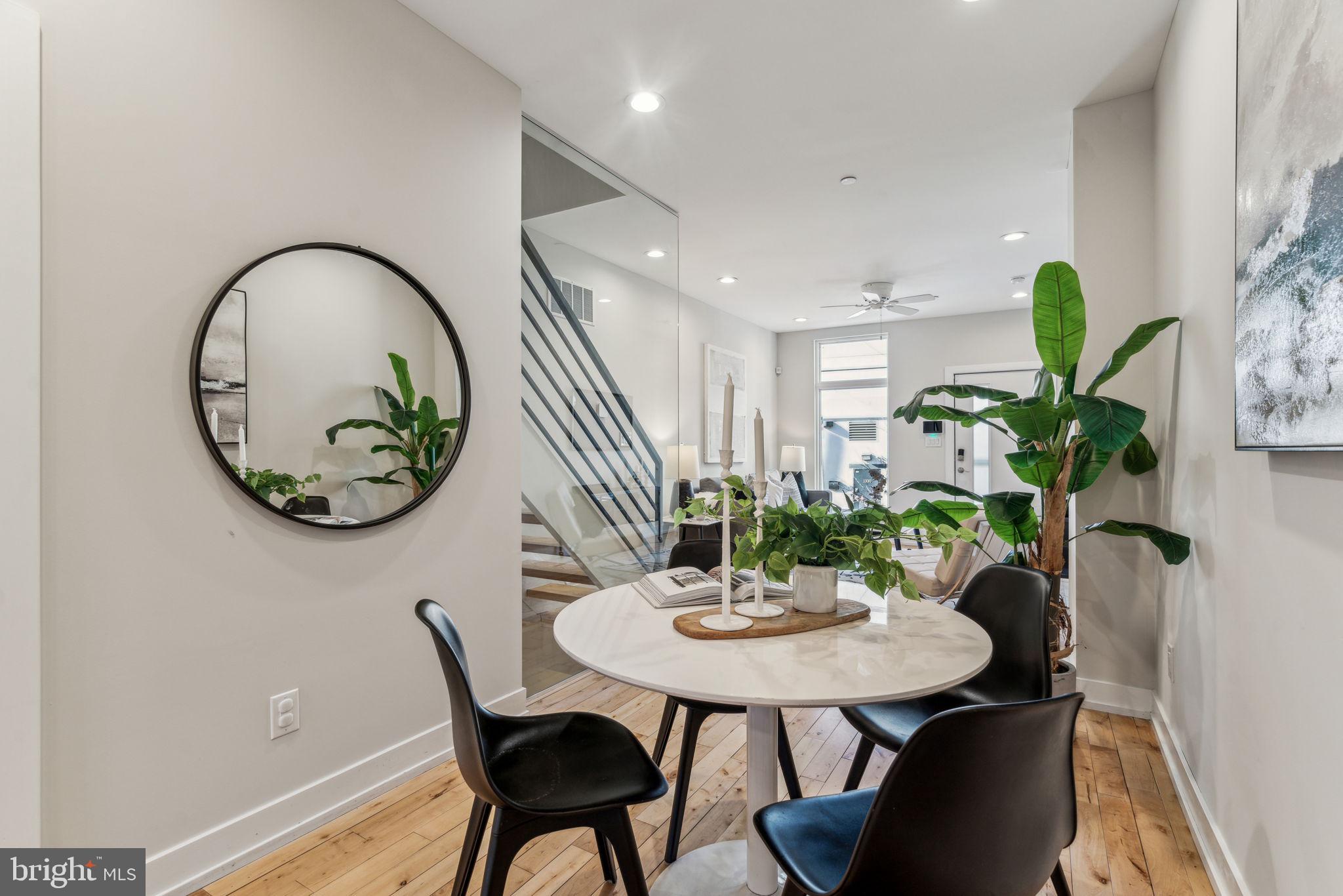 1335 North 30th Street Philadelphia, PA 19121 - Photo 6 of 58 a view of a dining room with furniture and wooden floor