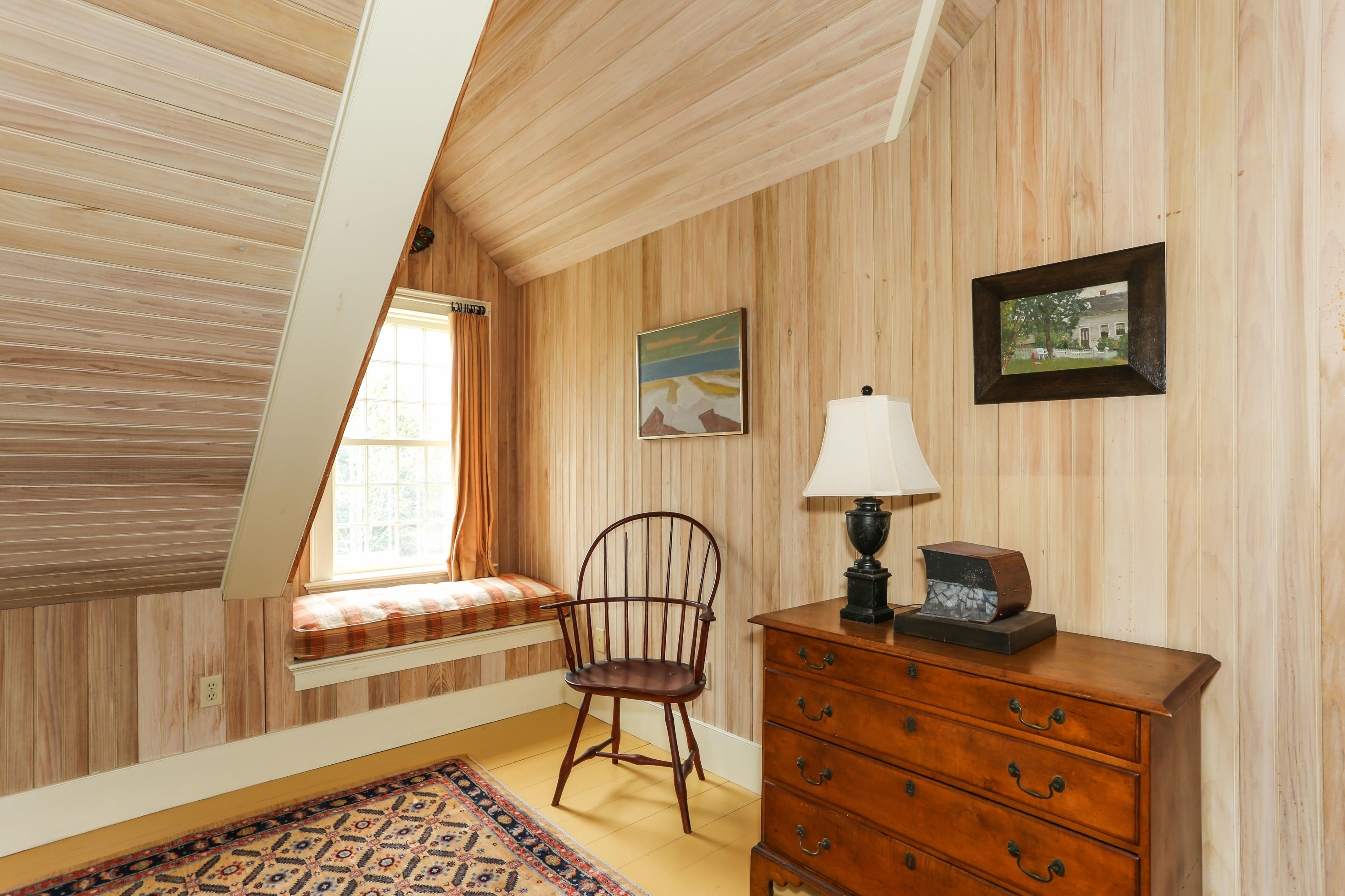 11-15 Franklin Street Provincetown, MA 02657 - Photo 14 of 26 a living room with a window and a table