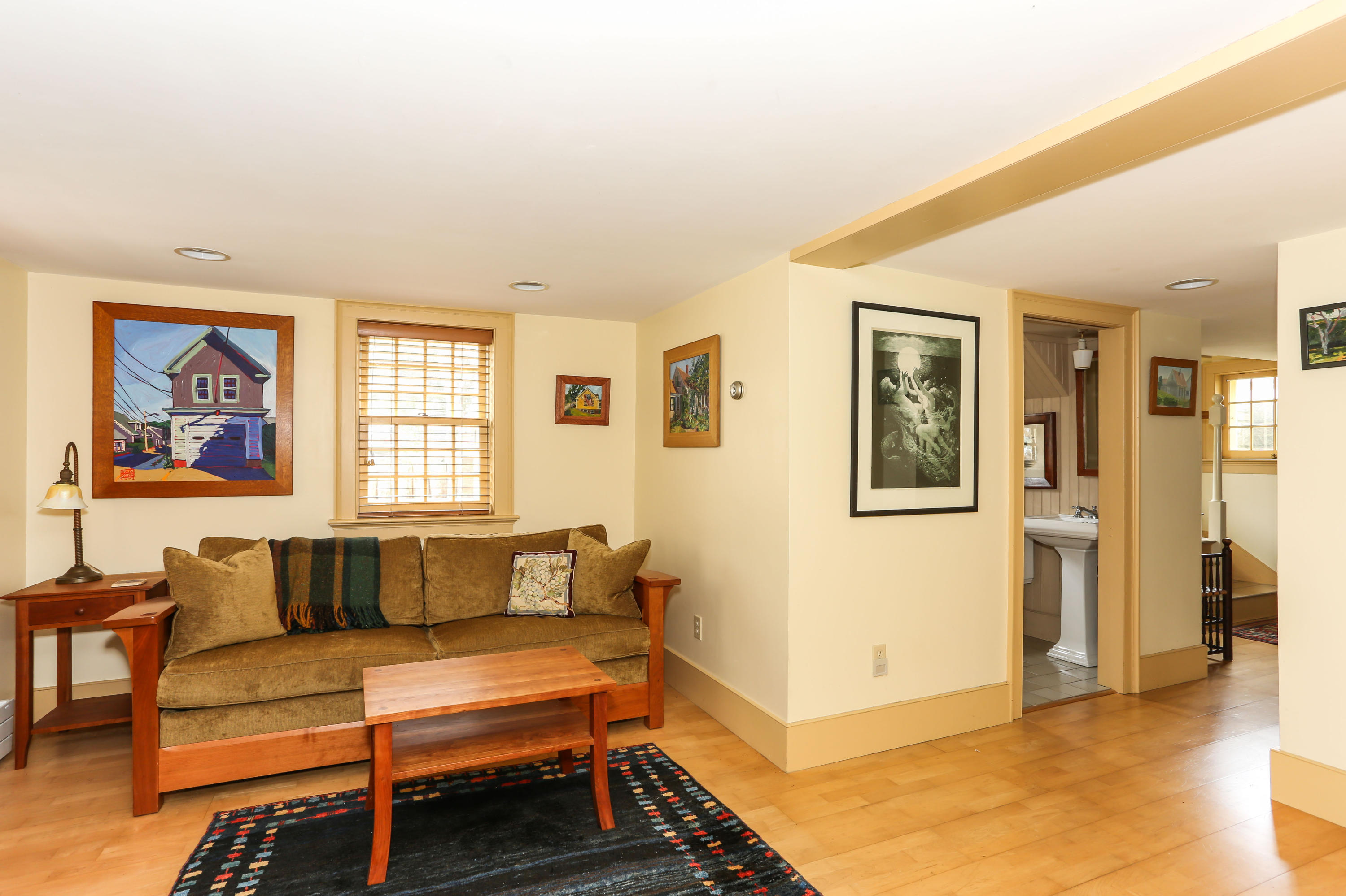 11-15 Franklin Street Provincetown, MA 02657 - Photo 18 of 26 a living room with furniture and a window